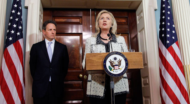 Secretary of State Hillary Rodham Clinton speaks as Treasury Secretary  Tim Geithner listens during a news conference about new sanctions the United States is taking to increase pressure on Iran.<font color=