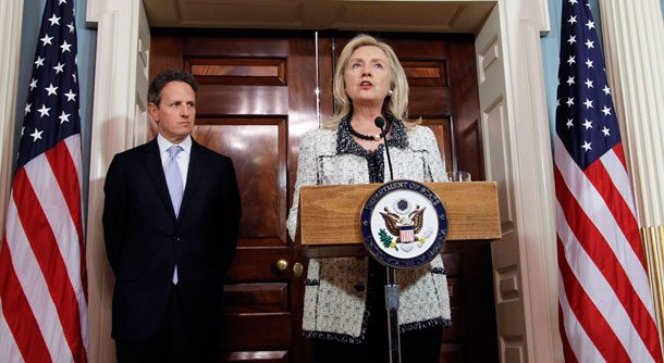 Secretary of State Hillary Rodham Clinton speaks as Treasury Secretary Tim Geithner listens during a news conference about new sanctions the United States is taking to increase pressure on Iran.<font color=