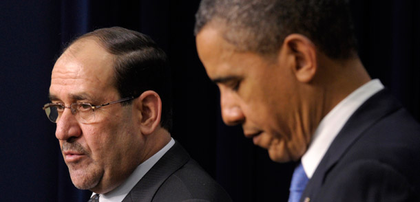 President Barack Obama listens as Iraq's Prime Minister Nouri al-Maliki speaks during a news conference in the South Court Auditorium at the White House in Washington on December 12, 2011. As the last of our troops pull out of Iraq, the administration needs to stay focused on lingering concerns in the country and the region. (AP/Susan Walsh)