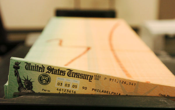 Trays of printed Social Security checks wait to be mailed from the U.S. Treasury's Financial Management services facility in Philadelphia. (AP/Bradley C Bower)