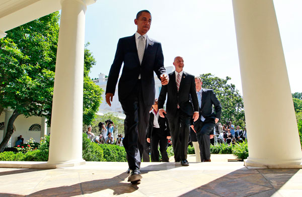 President Barack Obama, joined by small business owners, walks back to the White house after giving a speech on his small business initiatives in June 2010. (AP/Charles Dharapak)