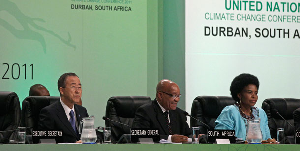 U.N. Secretary-General Ban Ki-moon, left, South African President Jacob Zuma, center, and South African Foreign Minister Maite Nkoana-Mashabane, right, attend the opening of the ministerial stage of a two-week 194-nation conference on climate change in Durban, South Africa, December 6, 2011. (AP/Schalk van Zuydam)