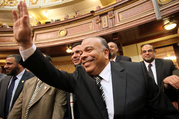 Saad el-Katatni waves after being nominated as Parliament Speaker by the Freedom and Justice Party, the party of the Muslim Brotherhood. While the United States may disagree with some of the Muslim Brotherhood's policies, we should continue diplomatic engagement instead of isolation. (AP/ Khaled Elfiqi)