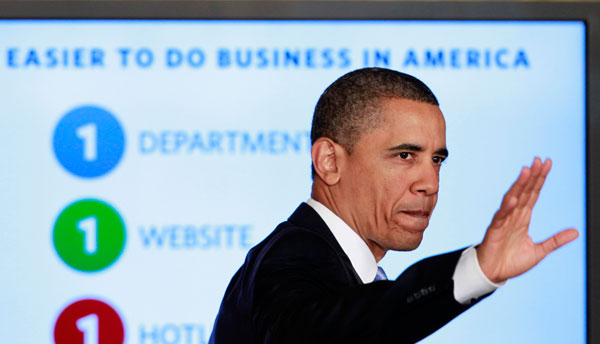 President Barack Obama waves after delivering remarks on government reform on January 13, 2012, in the East Room of the White House in Washington. (AP/Haraz N. Ghanbari)