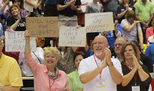 Cincinnati Tea Party supporters hold signs and cheer for speakers at a Tea Party rally in Cincinnati, Ohio, Thursday, April 15, 2010. (AP/Tom Uhlman)