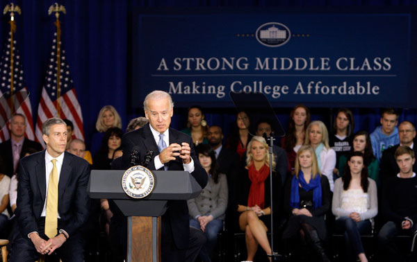 Vice President Joe Biden, accompanied by Education Secretary Arne Duncan, speaks in January about college costs and the Obama administration's efforts to make it more affordable. (AP/Jay LaPrete)