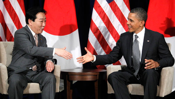 President Barack Obama shakes hands with Japanese Prime Minister Yoshihiko Noda in November 2011 at the APEC summit, where Trans-Pacific Partnership leaders met, in Hawaii.
  (AP/Charles Dharapak)