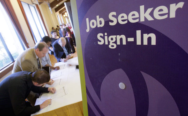 Job hunters line up to attend a job fair in California. The economy gained 243,000 jobs in January, and unemployment dropped to 8.3 percent, according to employment figures released by the Bureau of Labor Statistics. (AP/Chris Carlson)