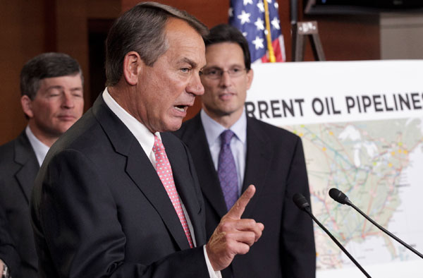 House Speaker John Boehner (R-OH), center, accompanied by House Majority Leader Eric Cantor (R-VA), right, and Rep. Jeb Hensarling (R-TX), gestures during a news conference to discuss President Barack Obama's decision to halt the Keystone XL pipeline.  (AP/J. Scott Applewhite)