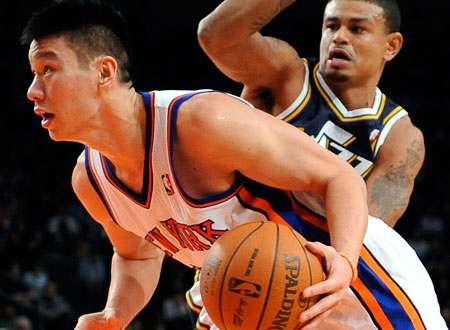 Jeremy Lin came out of nowhere to turn the New York Knicks' season around, but the conversation about his unlikely rise to fame has often included a racial component.  (AP/ Kathy Knomicek)