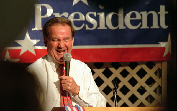 Republican presidential candidate Pat Buchanan laughs during a speech in California for more than 200 supporters in 1996. (AP/Rich Pedroncelli)