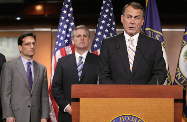 House Speaker John Boehner (R-OH), accompanied by House Majority Leader Eric Cantor (R-VA) and Majority Whip Kevin McCarthy (R-CA), speaks in July 2011 during a news conference about the debt limit crisis.
  (AP/J. Scott Applewhite)