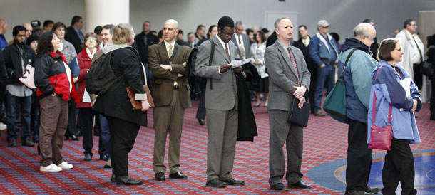 Job seekers stand line during the Career Expo job fair on March 7, 2012 in Portland, Oregon. Rep. Paul Ryan's (R-WI) does little to remedy the woes of the country's unemployed, instead imposing a set of austerity measures that place the burden of deficit reduction on the poor and middle class, while continuing tax breaks for the rich. (AP/ Rick Bowmer)