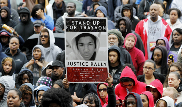 People attend a rally demanding justice for Trayvon Martin in Freedom Plaza, Saturday, March 24, 2012, in Washington, D.C. (AP/Haraz N. Ghanbari)