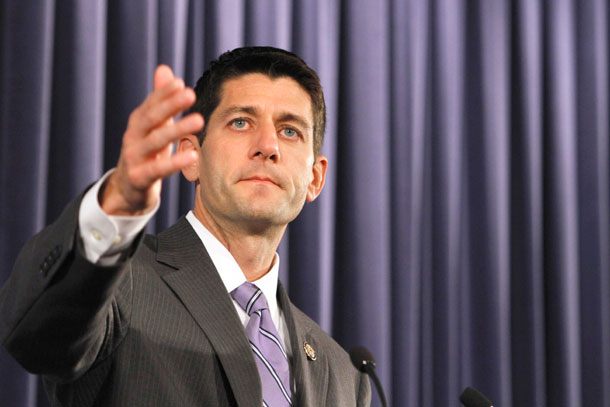A real analysis of Rep. Paul Ryan's (R-WI) budget proposal reveals that despite claims to the contrary, the budget does not reduce the national debt over the long term. (AP/ Jacquelyn Martin)