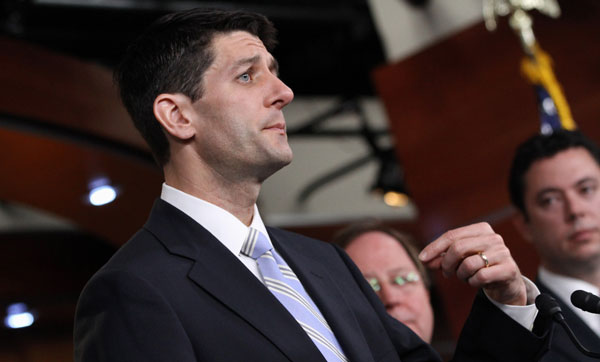 House Budget Committee Chairman Paul Ryan (R-WI), left, speaks about his budget plan during a news conference on Capitol Hill in Washington.
<br /> (AP/Jacquelyn Martin)