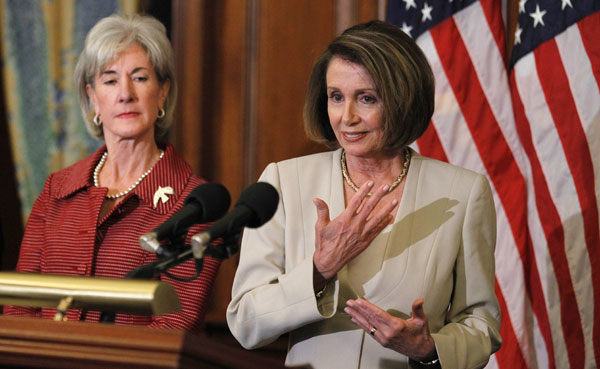 Former House Speaker Nancy Pelosi (D-CA), right, with Health and Human Services Secretary Kathleen Sebelius, speaks about benefits and answers questions about the Affordable Care Act and Medicare during a news conference on Capitol Hill in May 2010.
<br /> (AP/Manuel Balce Ceneta)