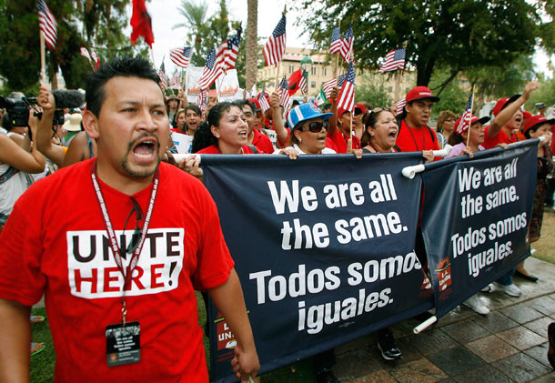 Hundreds of members of the Los Angeles County Federation of Labor march to the Arizona state capitol building in protest of Arizona's anti-immigrant S.B.1070. (AP/ Ralph Freso)