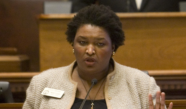 State Rep. Stacey Abrams (D-Atlanta) speaks out against an immigration bill in the House chamber in front of House Speaker David Ralston (R-Blue Ridge), Thursday, March 3, 2011, in Atlanta, Georgia. (AP/John Amis)