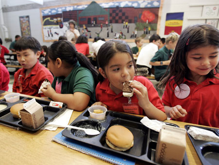 Because House Republicans included cuts to a provision that coordinates essential nutrition assistance with other safety net programs, 280,000 children would no longer be automatically eligible for free school breakfast and lunch. (AP/ Eric Miller)