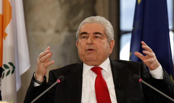 Cyprus President Dimitris Christofias addresses reporters during a news conference on long-running negotiations with breakaway Turkish Cypriots to reunify the war-divided island at the Presidential Palace in the divided capital Nicosia, Wednesday, March 21, 2012. (AP/Petros Karadjias)