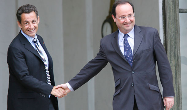 French President Nicolas Sarkozy, left, shakes hands with Socialist Party Secretary General Francois Hollande at the Elysee Palace in 2007. Sarkozy and Hollande are running against each other for president of France.
<br /> (AP Photo)