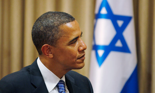 Then-Sen. Barack Obama (D-IL) listens to Israel's President Shimon Peres, not seen, during a 2008 meeting in Jerusalem. Obama's election roused questions among conservative Jews about why Jews tend to vote for liberal candidates and whether that trend will continue in 2012.
(AP/Baz Ratner)
