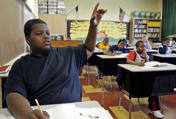The Common Core Standards were developed to effectively address  negative outcomes by focusing on the power of a high-quality education,  informed by rigorous standards, to lift individuals out of poverty. (AP/ Morry Gash)