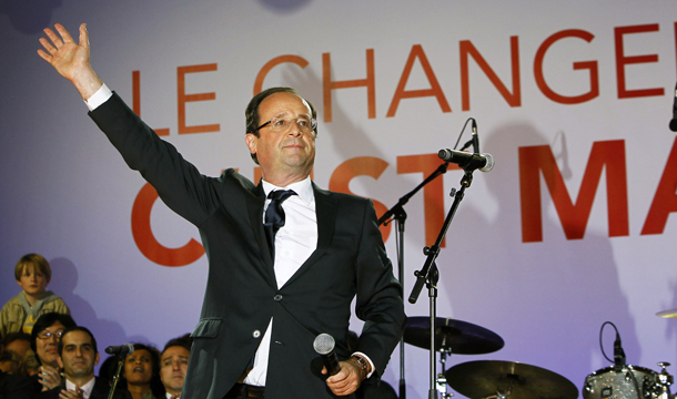 French President-elect Francois Hollande waves to supporters gathered to celebrate his election victory in Bastille Square in Paris, France, Sunday, May 6, 2012. (AP/Francois Mori)