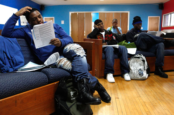 Donnie Dawson, 20, left, attends a youth advocacy group meeting at the Ruth Ellis Center, a drop-in shelter  for LGBT youth in Detroit.  