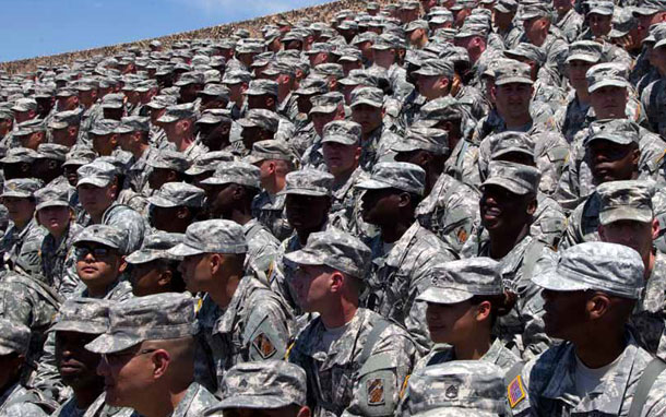 Troops wait for President Barack Obama and First Lady Michelle Obama to arrive at the Third Infantry Division Headquarters on April 27, 2012, at Fort Stewart, Georgia.
<br /> (AP/Carolyn Kaster)