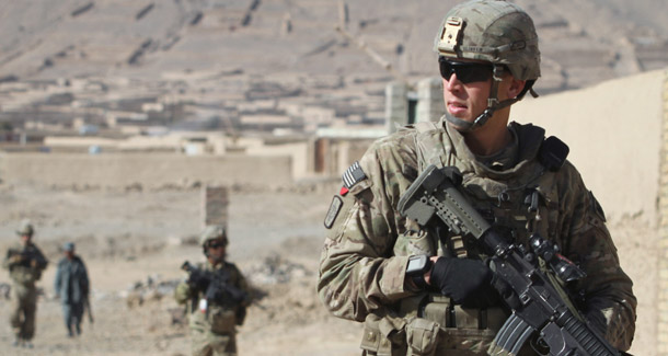 U.S. soldiers with the NATO-led International Security Assistance Force are seen during a foot patrol in Kandahar, south of Kabul, Afghanistan, on January 7, 2012. NATO members will focus on handing security over to Afghanistan at their summit next week, but the alliance also must grapple with long-term challenges.
<br /> (AP/Allauddin Khan)