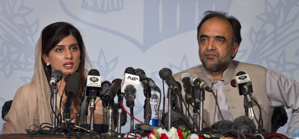 Pakistan's Foreign Minister Hina Rabbani Khar, left, speaks as Pakistan's Information Minister Qamar Zaman Kaira looks on during a press conference in Islamabad, Pakistan on May 14, 2012. Khar indicated the time has come to reopen the country's Afghan border to NATO troop supplies. Several other security issues loom between the United States and Pakistan besides the supply lines.
<br /> (AP/Anjum Naveed)