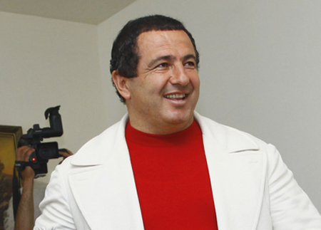 Gagik Tsarukian, leader of the Prosperous Armenia Party, casts his ballot during parliamentary elections in Yerevan, Armenia, on Sunday, May 6, 2012. (AP/Varo Rafaelyan)