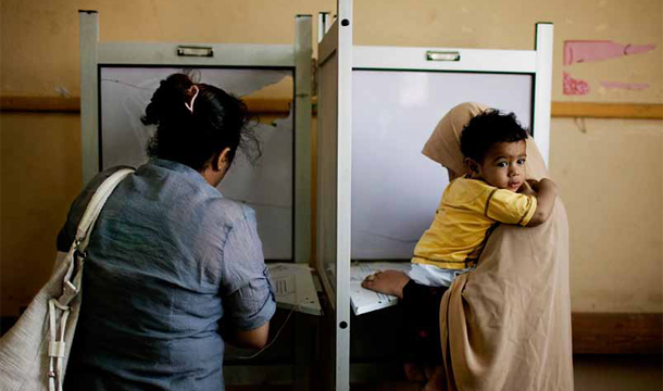 Female Egyptian voters cast their votes during the second day of presidential elections in the Mataraya neighborhood of Cairo, Egypt, Thursday, May 24, 2012. (AP/Pete Muller)