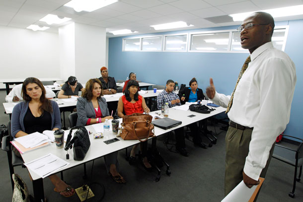 Rodney Brown speaks to students during the Project Empowerment workshop  at Department of Employment Services in Washington, D.C. Washington’s program  is one of several transgender-oriented career development classes,  workshops, or job fairs that have popped up around the country. (AP/ Jose Luis Magana)