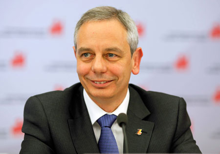 Michael Vassiliadis, president of Germany’s industrial union for Mine, Chemical and Energy Workers, or IG BCE, and the newly created European trade union federation IndustriAll, credits strong unions and culture of dialogue with business as the keys to Germany's relative weathering of the global financial crisis. (AP/ Axel Heimken)