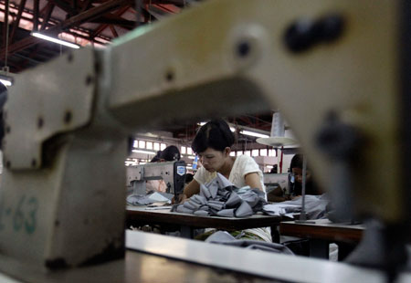 A Myanmar woman works at a garment factory in Yangon, Myanmar. (AP/ Sakchai Lalit)