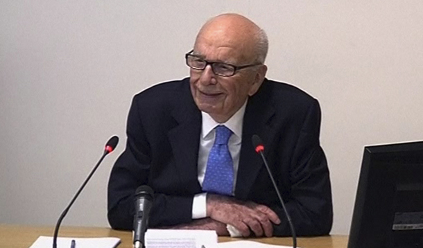 In this image from video, News Corporation Chairman Rupert Murdoch appears at Lord Justice Sir Brian Leveson's inquiry in London, Wednesday, April 25, 2012, to answer questions under oath about how much he knew about phone hacking at the <i>News of the World</i> tabloid. (AP)