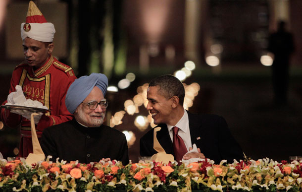 President Barack Obama and India's Prime Minister Manmohan Singh smile during a state dinner at Rashtrapati Bhavan, or President's Palace, in New Delhi, India in 2010. (AP/ Manish Swarup)