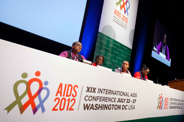 Lawrence Stallworth II of left, who was diagnosed  with HIV at age 17, speaks on a youth panel at the International AIDS Conference in Washington, D.C. ﻿The high rates of HIV/AIDS we see among communities of color are not the result of high-risk behavior in these communities, but structural inequalities that make them more likely to come in contact with the disease and less likely to treat it. (AP/ Jacquelyn Martin)