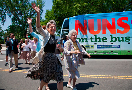 Sister Simone Campbell, left, and Sister Diane Donoghue, right, lead the way as the the 