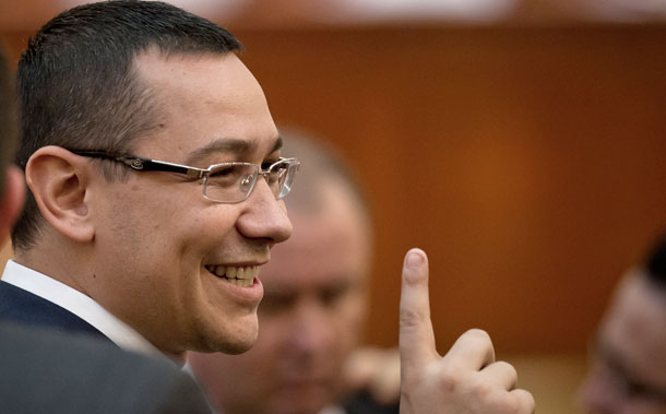 Romanian Prime Minister Victor Ponta gestures before a parliament session in Bucharest, Romania.
<br /> (AP/Vadim Ghirda)