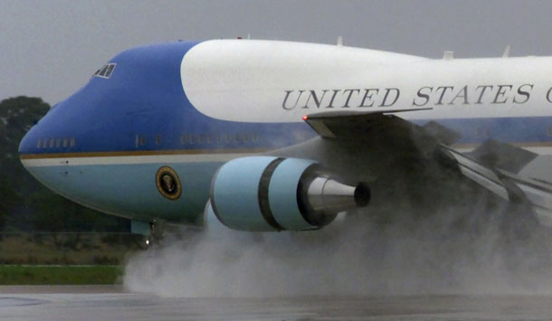 Air Force One splashes water on the runway at Northwest Regional Airport in Arkansas. This airport and many like it face possible closure if budget sequestration forces the Federal Aviation Administration to make severe budget cuts.  (AP/Danny Johnston)