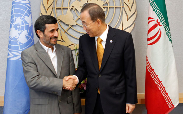 U.N. Secretary General Ban Ki-moon, right, meets Iranian President Mahmoud Ahmadinejad, left, in 2010 at U.N. headquarters. The upcoming Non-Aligned Movement conference in Tehran is a good opportunity to get Iran to focus on human rights. (AP/Mary Altaffer)