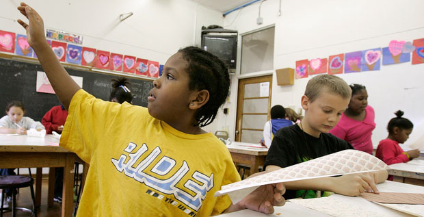 Across our country we are spending less on students of color than on white students, at least when it comes to state and local dollars. (AP/ Charlie Neibergall)