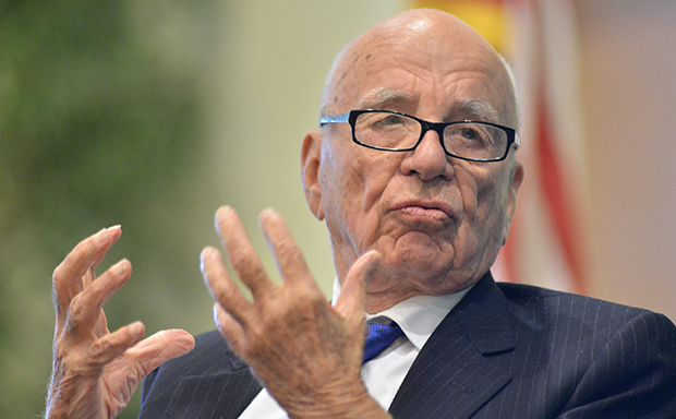News Corp. CEO Rupert Murdoch speaks during a forum in Boston, Tuesday, August 14, 2012. Fox News and The Wall Street Journal, both owned by News Corp., have deliberately distorted the work of climate scientists for reasons of ideological obsession and financial gain. (AP/Josh Reynolds)