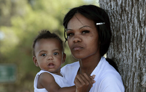 22-year-old single mother Nicole Range poses for a photo with her son, Demareau, in Sacramento, California, Monday, June 18, 2012. (AP/Rich Pedroncelli)