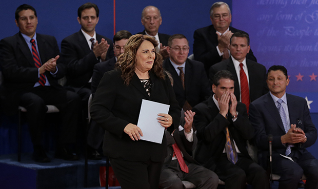 Moderator Candy Crowley passes members of the audience as she arrives at the second presidential debate at Hofstra University, Tuesday, October 16, 2012, in Hempstead, New York. (AP/Eric Gay)