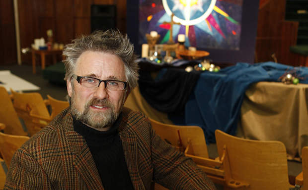 Rev. Mark Tidd sits in the Highlands Church in Denver, Colorado. His church is an evangelical Christian church guided both by the Apostle's Creed and the belief that gays and lesbians can embrace their sexual orientations as God-given and seek fulfillment in committed same-sex relationships. (AP/Ed Andrieski)